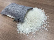 ST25 · Rice sample on a wooden surface