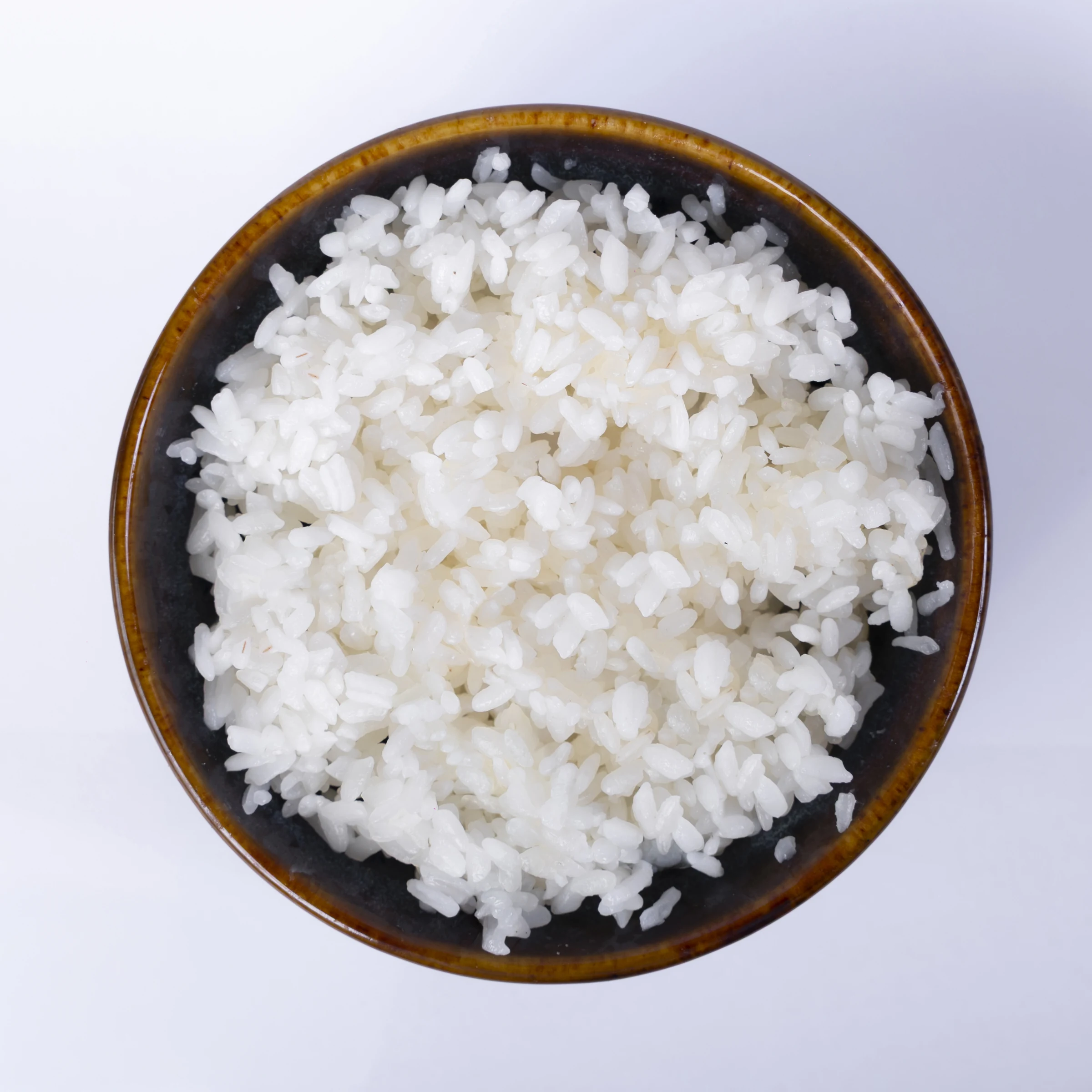 Japonica cooked-rice photograph from the supplied Vũ Phong Phú product archive. Cooking conditions should be recorded in your own sample trial.