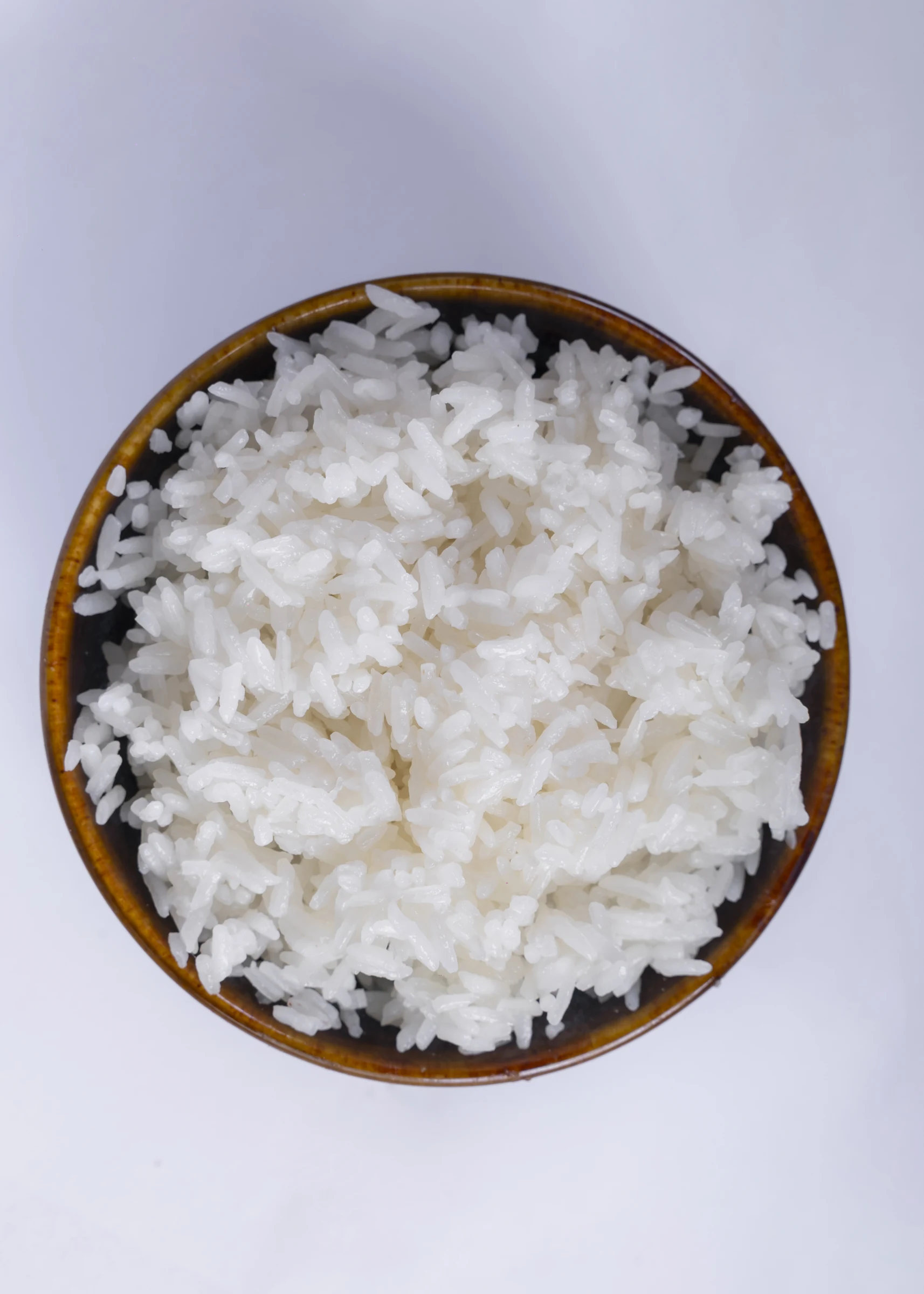 OM5451 cooked-rice photograph from the supplied Vũ Phong Phú product archive. Cooking conditions should be recorded in your own sample trial.