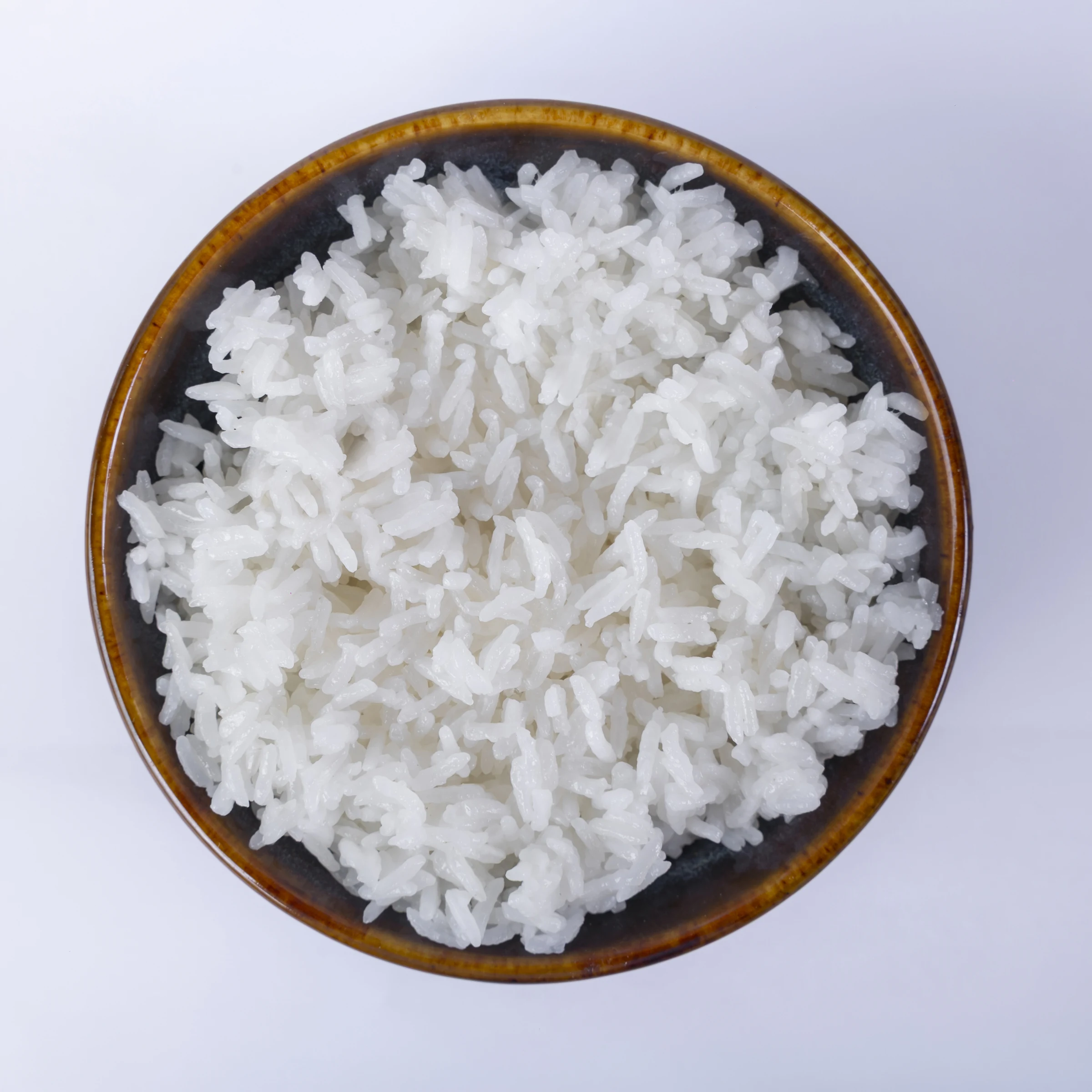 ST21 cooked-rice photograph from the supplied Vũ Phong Phú product archive. Cooking conditions should be recorded in your own sample trial.