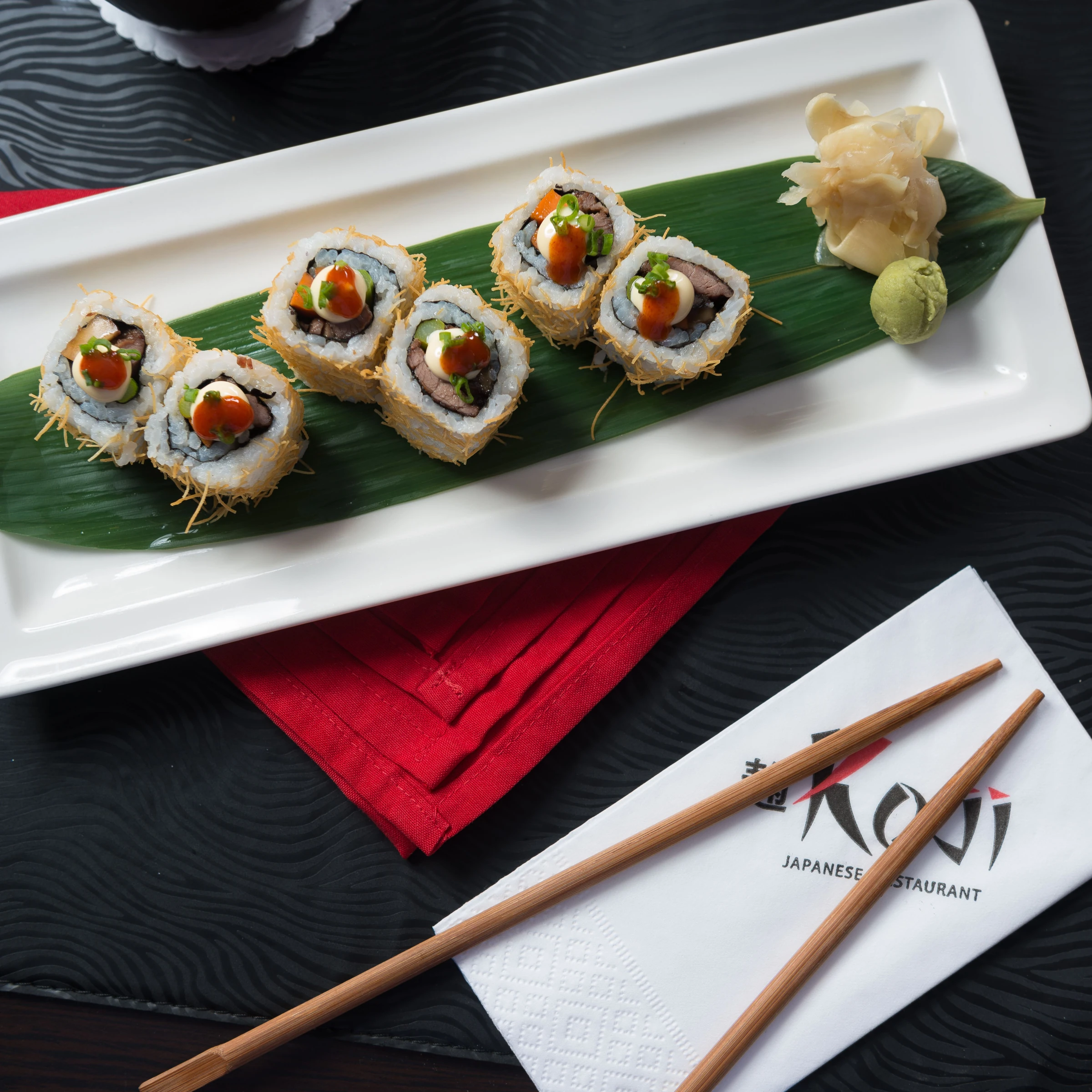 Japonica Sushi Rolls with Cucumber and Cooked Seafood — serving inspiration