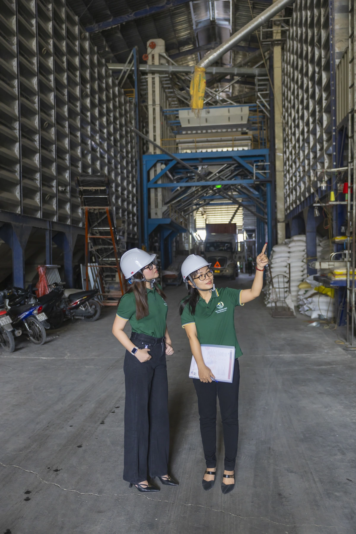 Factory team reviewing buyer production requirements