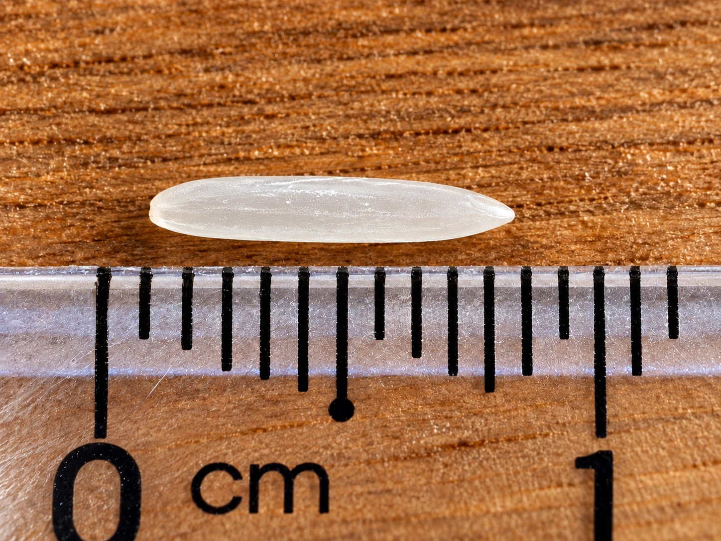 KDM · Grain beside a ruler